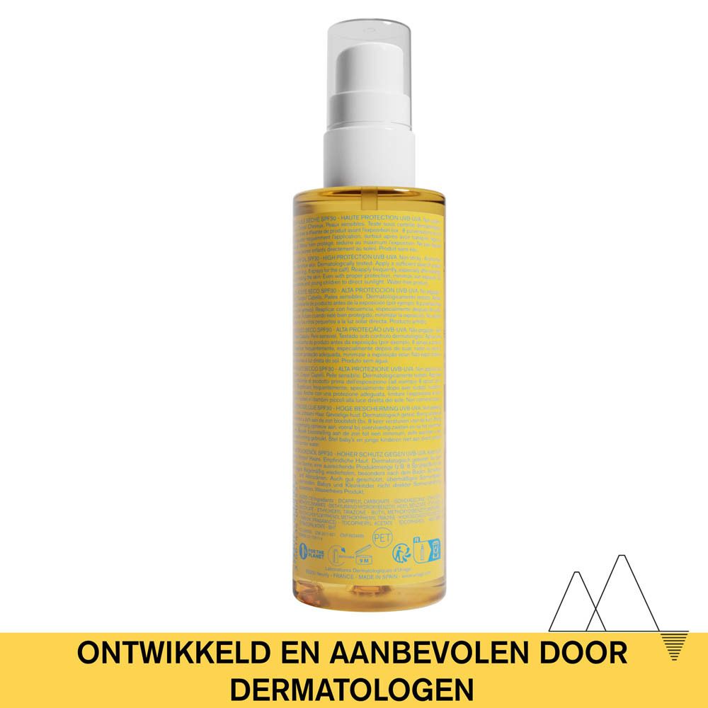 Uriage Bariésun Dry Oil SPF 30. Fles met spraykop. Geelachtige vloeistof. Productinformatie op het etiket.
