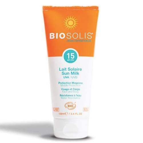 Tube de lait solaire LSF 15. Design orange et blanc. Logo BIOSOLIS et nom du produit. Symbole solaire. Résistant à l'eau.