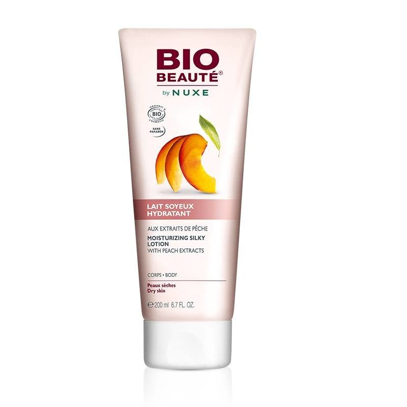 Witte tube met productillustratie en tekst. Opschrift: BIO BEAUTÉ by NUXE. Bevat perzikextracten. Voor de droge huid.