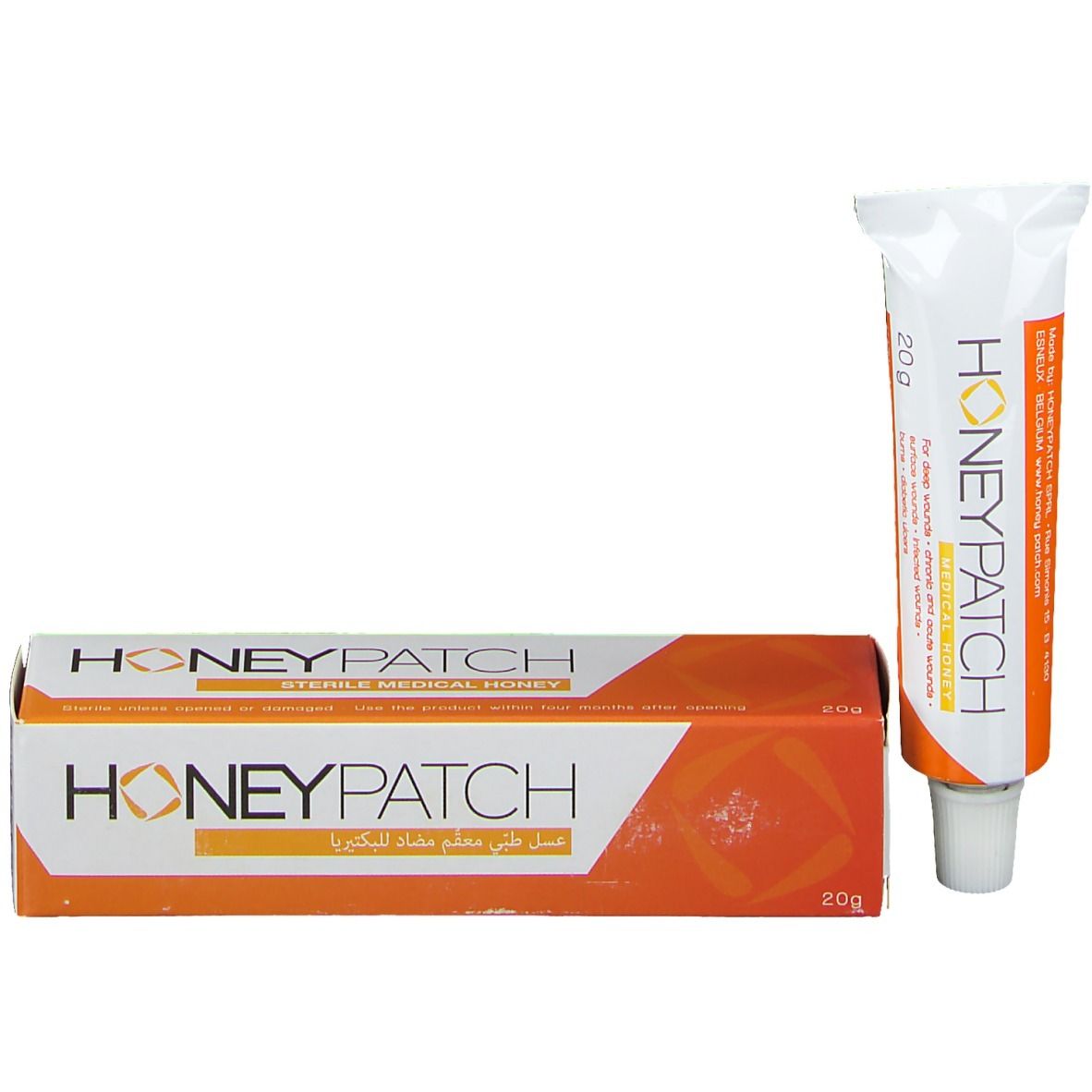 Emballage avec tube de miel. Design blanc et orange. Inscription: Honeypatch. 20g. Miel médical stérile. Écriture arabe.