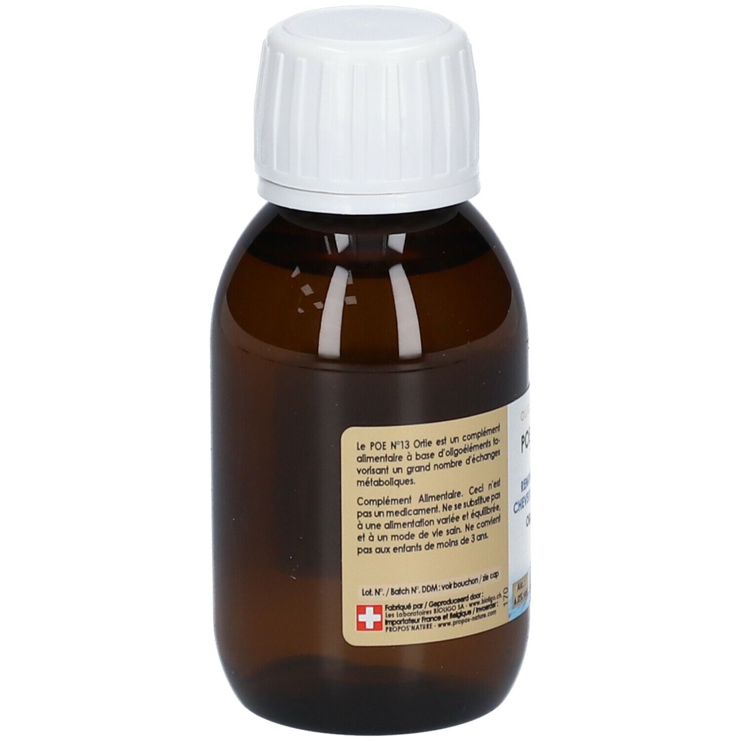 Bruine glazen fles met witte dop. Etiket met productinformatie. Zwitsers kruis. Tekst: POE N°13, Oligoéléments.