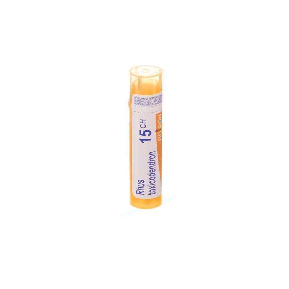 Tube cylindrique orange. Étiquette avec "Rhus toxicodendron 15CH" et "BOIRON".