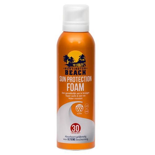 Flacon orange avec bouchon blanc. Texte: Huntington Beach Sun Protection Foam, SPF 30, label UVA.