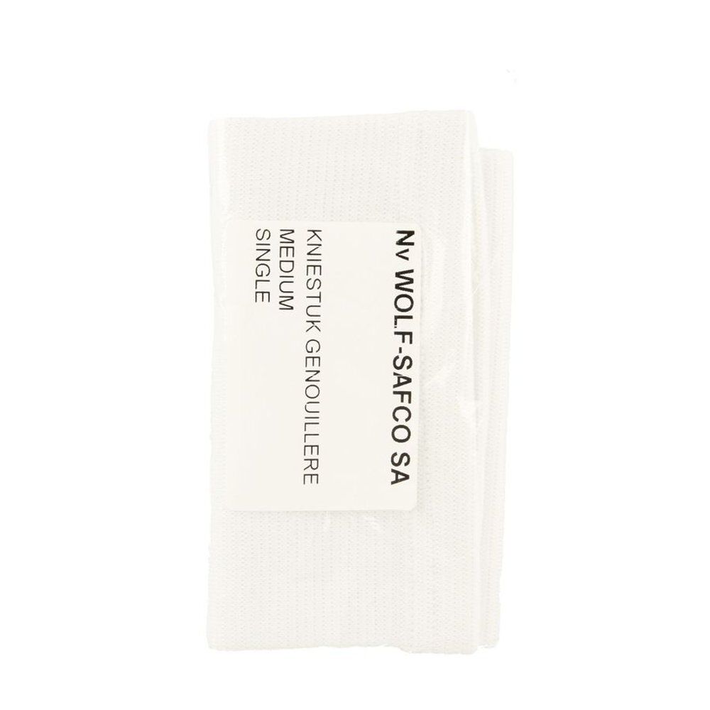 Gevouwen witte kniebrace. Label met productinfo: MEDIUM, SINGLE, WOLF-SAFCO SA.