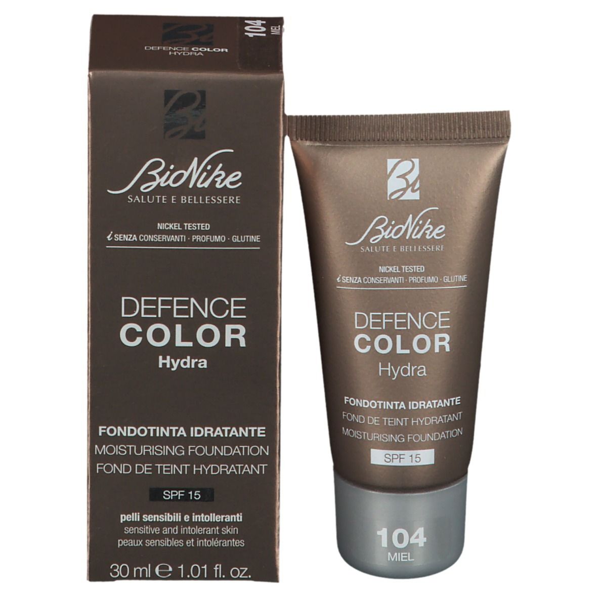 Foundation tube en verpakking. Merk BioNike, Defence Color Hydra. Tint 104 Miel. SPF 15. Getest op nikkel.