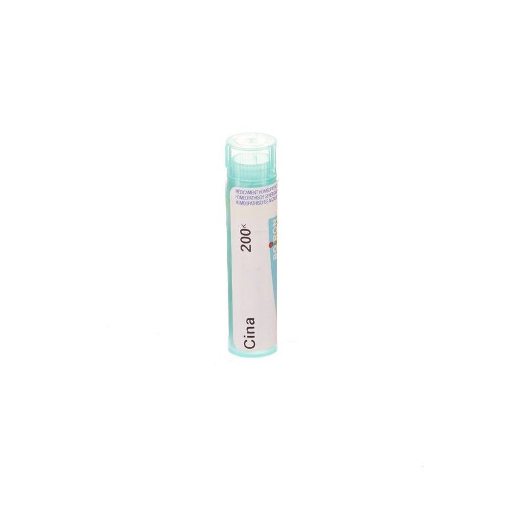 Tube cylindrique en plastique vert avec étiquette blanche. Inscription : Cina 200K. Bouchon transparent.