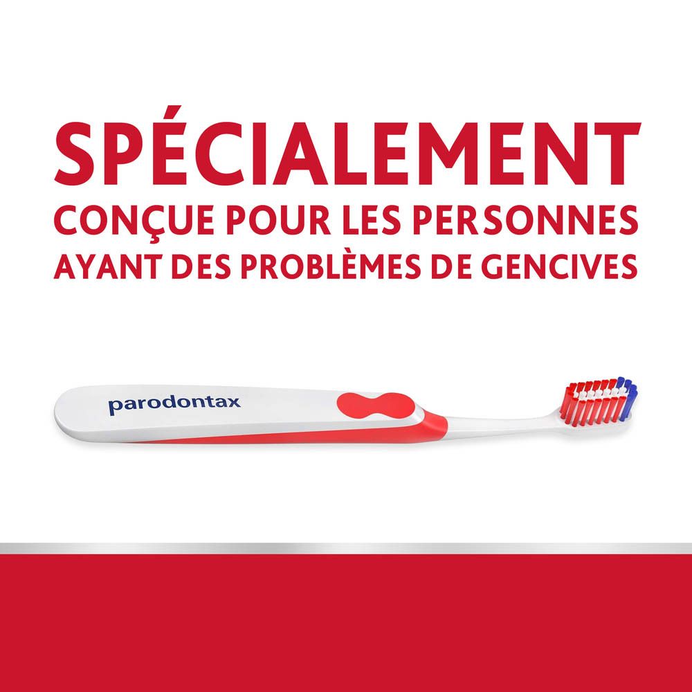 Brosse à dents avec manche rouge et tête de brosse rouge. Texte : Spécialement conçue pour les personnes ayant des problèmes de gencives.