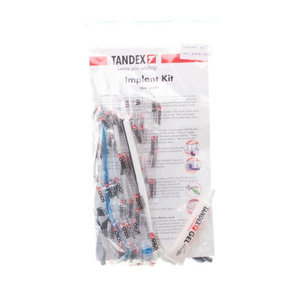 Verpakking Tandex Implant Kit. Bevat tandenborstels, gel en instructies. Transparante plastic.