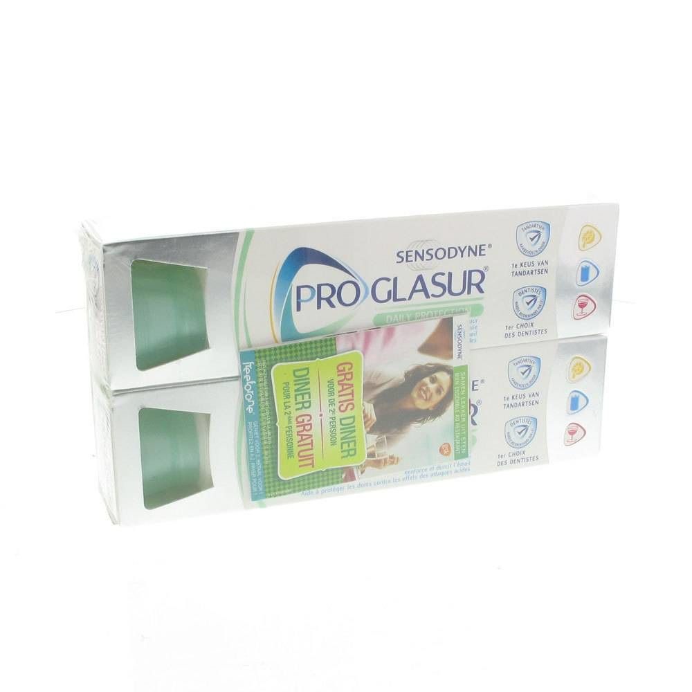 Deux boîtes de dentifrice Sensodyne Pro Glasur. Emballage avec publicité "Diner Gratuit".
