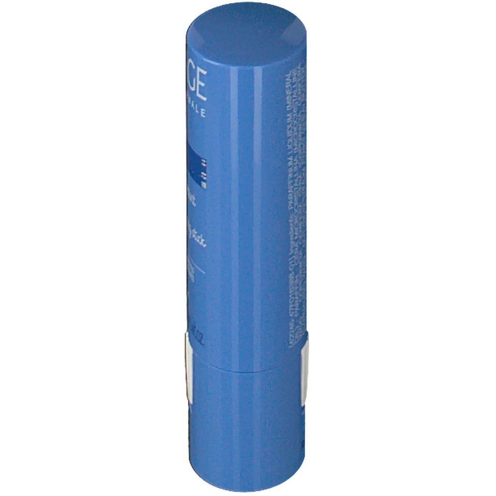 Blauwe stick, zijaanzicht. Witte sticker met tekst. Uriage-logo en productnaam gedeeltelijk zichtbaar.