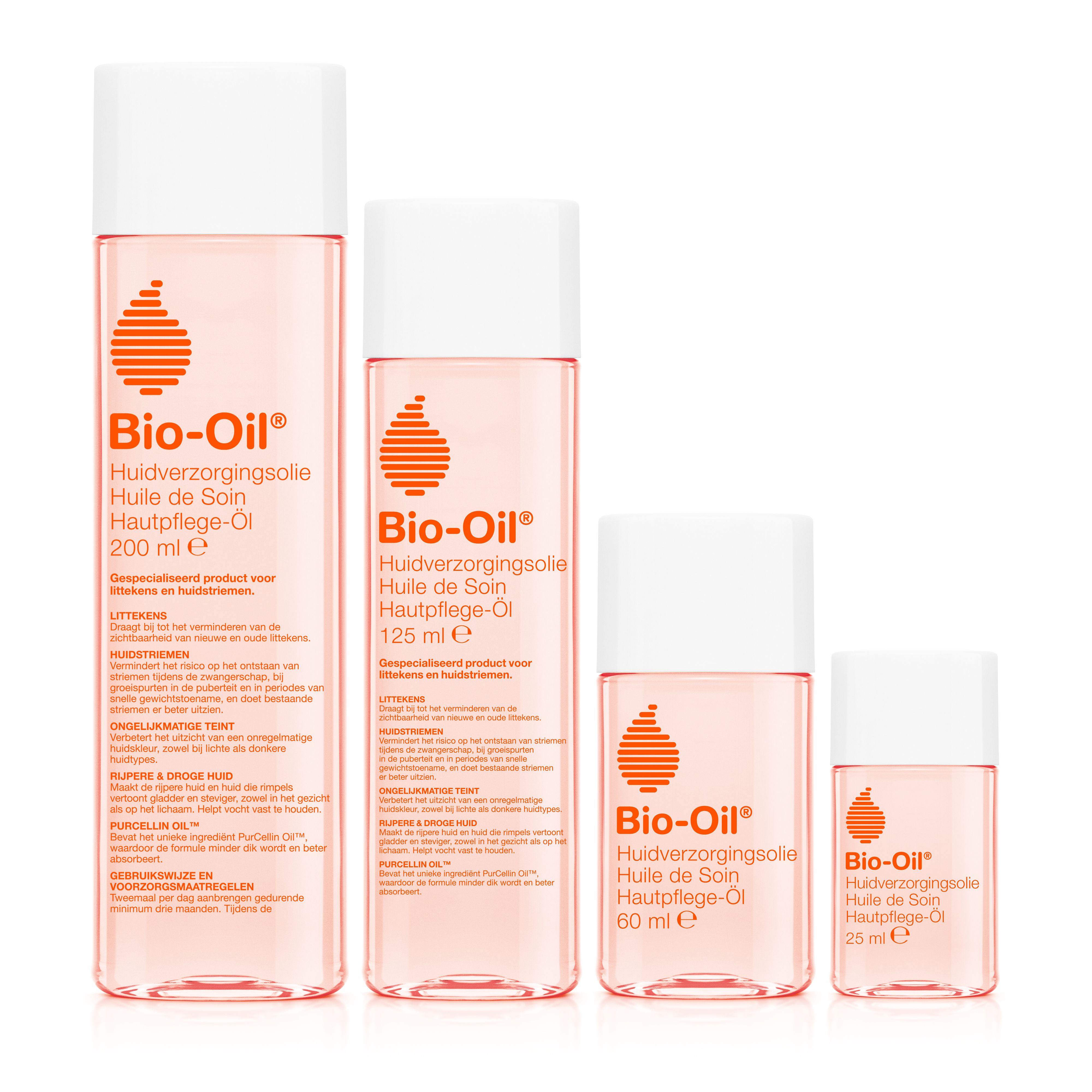 Vier flessen Bio-Oil. Verschillende maten, roze vloeistof, witte dop. Opschrift: Bio-Oil Huile de Soin.