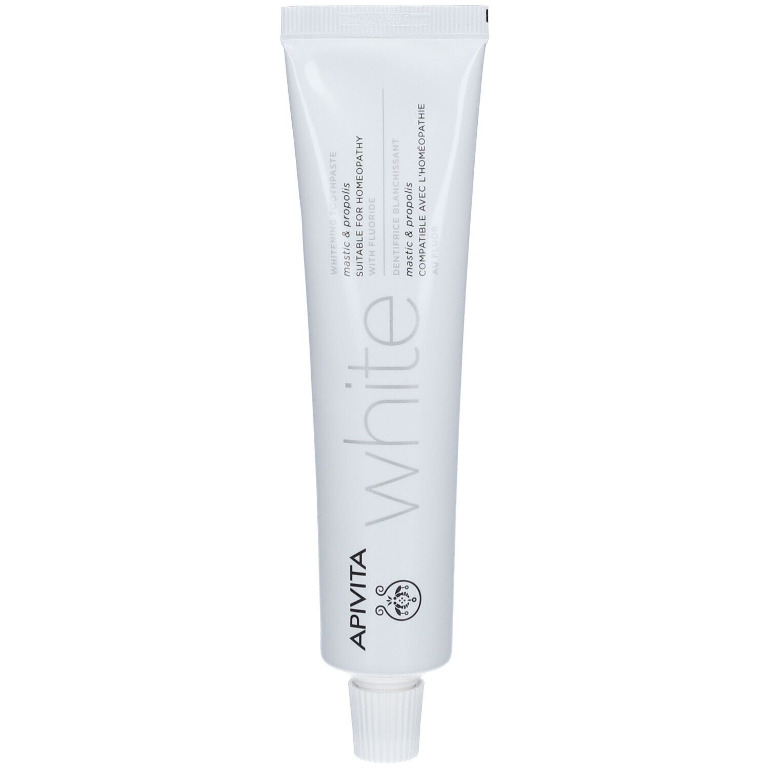 Witte tube met APIVITA logo en "white" opdruk. Bevat Mastic & Propolis, geschikt voor homeopathie.