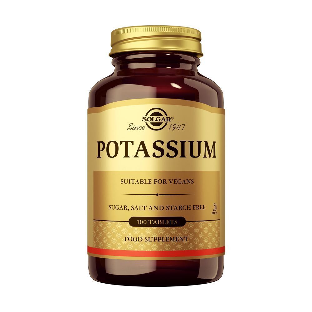 Bruine glazen fles met gouden dop. Etiket met "POTASSIUM", "100 TABLETS" en "SUITABLE FOR VEGANS". 