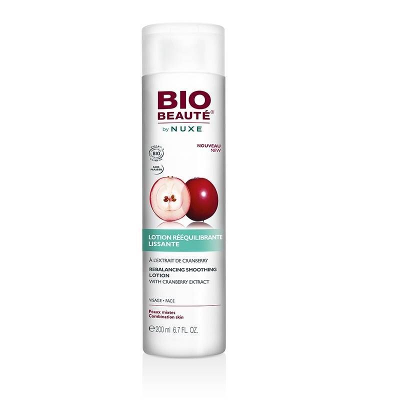 Witte fles met witte dop. Opschrift: BIO BEAUTÉ by NUXE. Illustratie van cranberry. Tekst: Lotion rééquilibrante lissante.