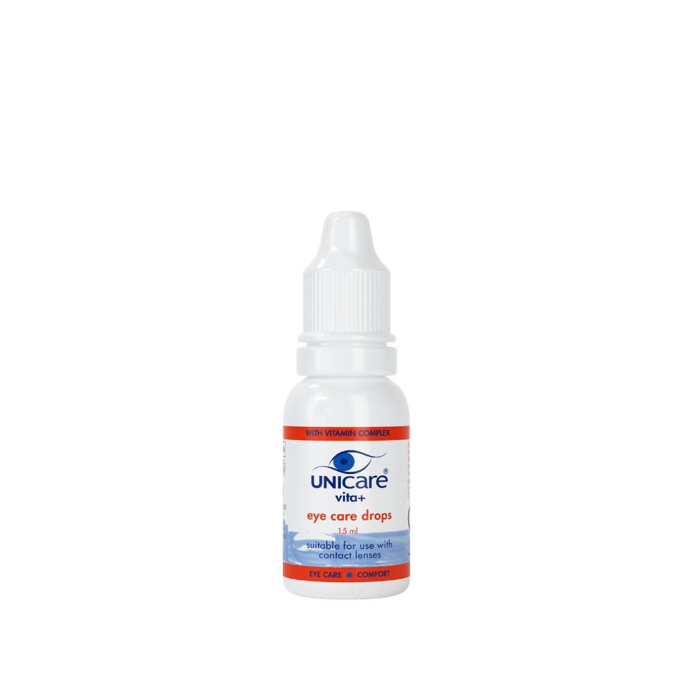 Flacon blanc de gouttes oculaires. Inscription: UNICARE vita+ eye care drops. 15 ml.