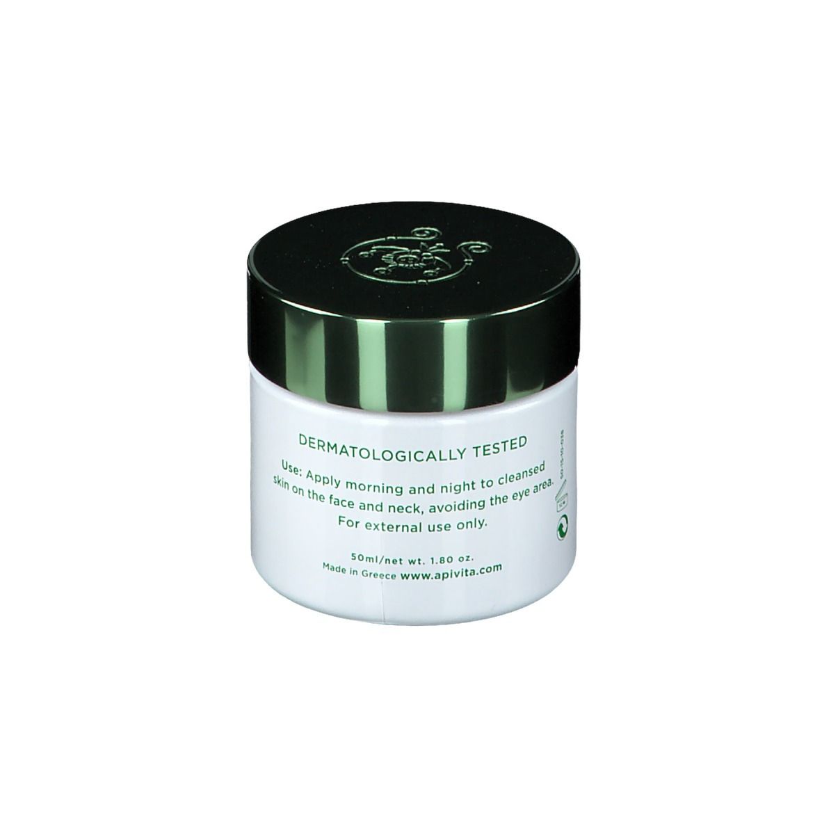 Witte crèmepot met groene deksel. Opschrift: Dermatologisch getest. Gebruiksaanwijzing. 50ml/net wt. 1.8oz.