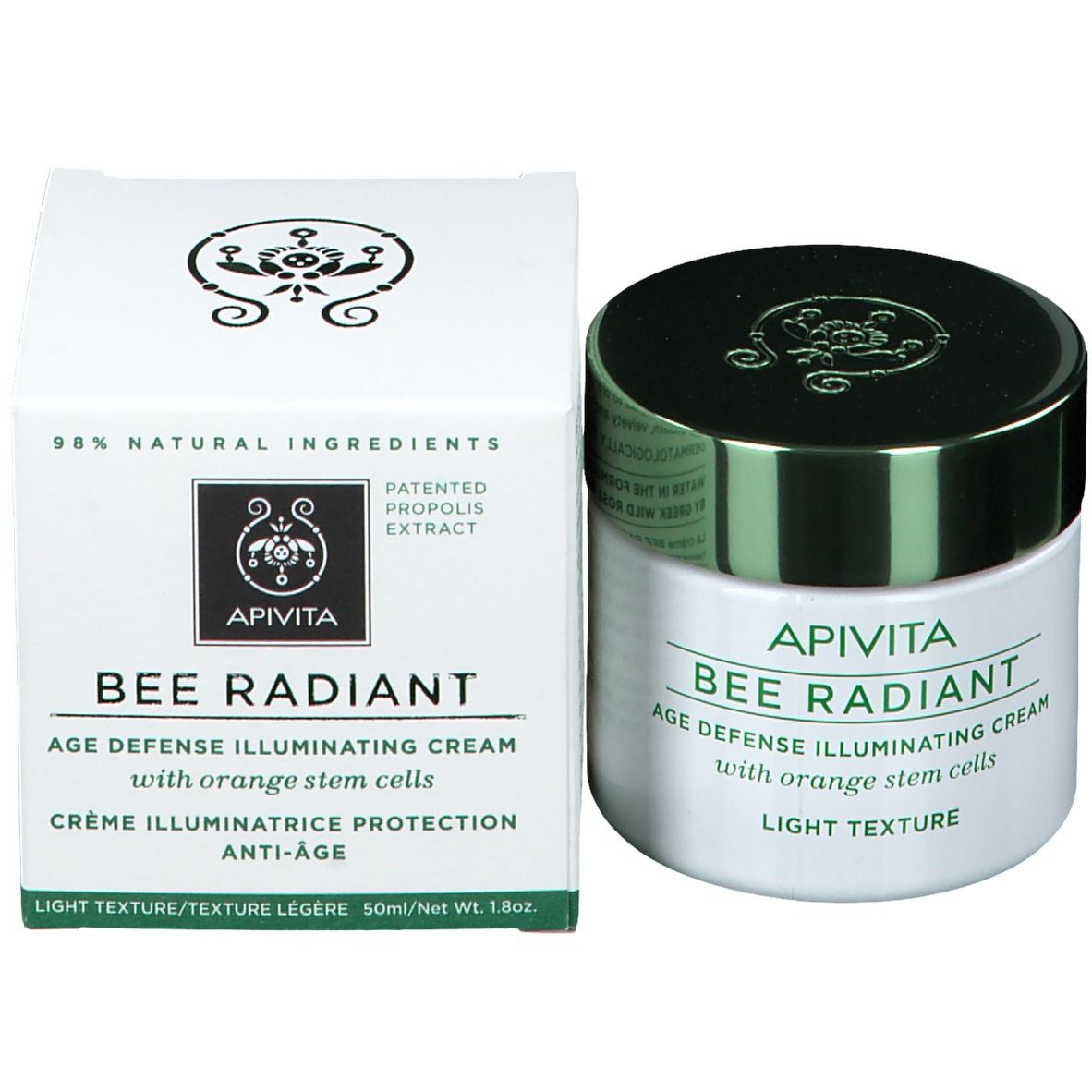 Crèmepot en doos. Opschrift: Apivita Bee Radiant Age Defense Illuminating Cream, Light Texture. 98% natuurlijke ingrediënten.