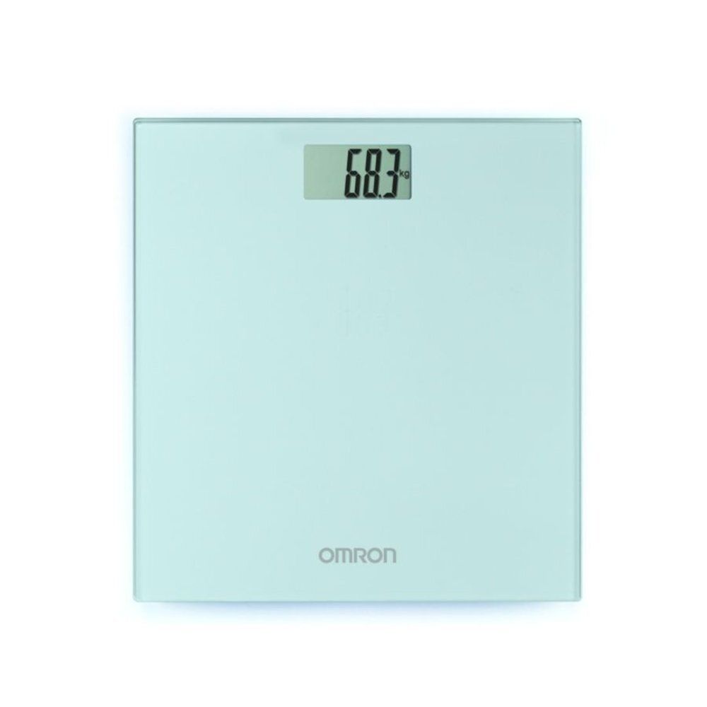 Balance numérique Omron HN-289-ESL, surface vert clair. Affichage : 68.3. Marque Omron visible.
