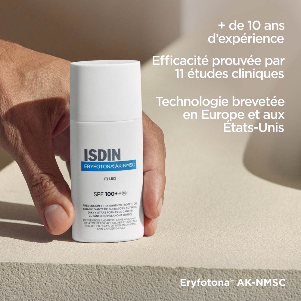 Fluide blanc ISDIN. Inscription : Eryfotona AK-NMSC, SPF 100+. Produit et texte.