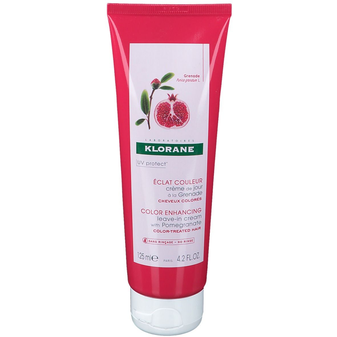Tube rouge avec étiquette blanche. Inscription: KLORANE, extrait de grenade, crème sans rinçage pour cheveux colorés.
