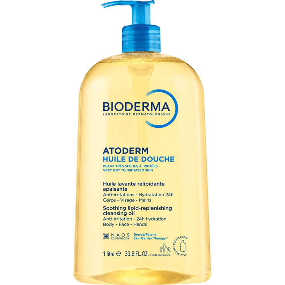 Fles BIODERMA Atoderm Huile de douche. Gele vloeistof, blauwe pomp. Tekst: Atoderm, Huile de douche.