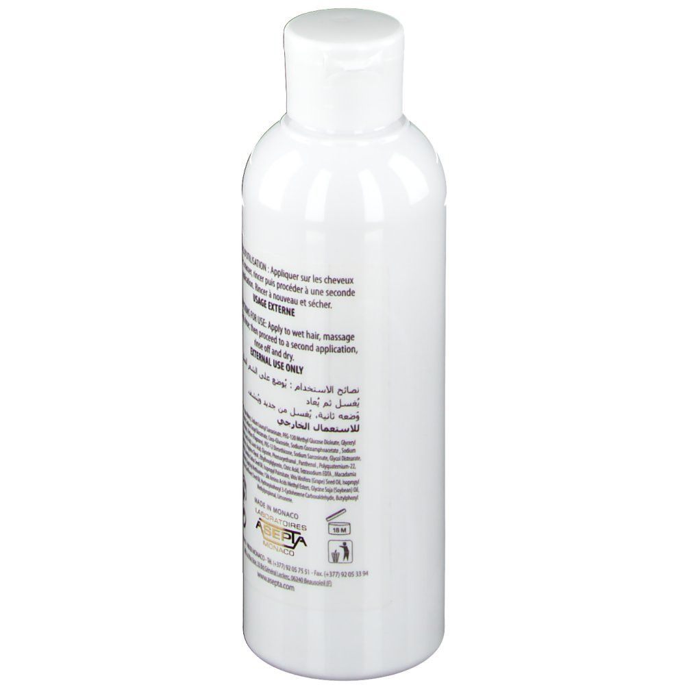 Ecrinal ANP 2+ Shampooing Femme. Dos de la bouteille blanche. Texte et informations d'utilisation.