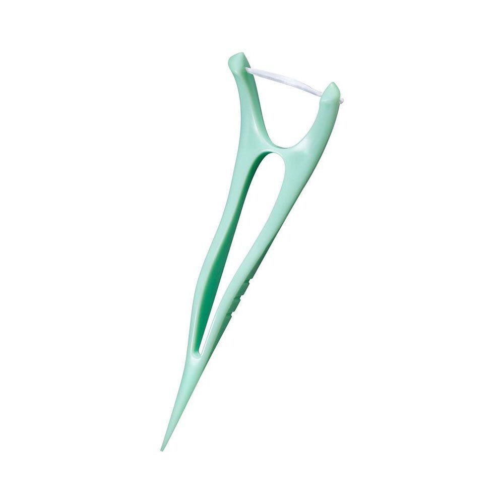 Enkele flosser. Groenachtig plastic, Y-vorm. Met flosdraad.