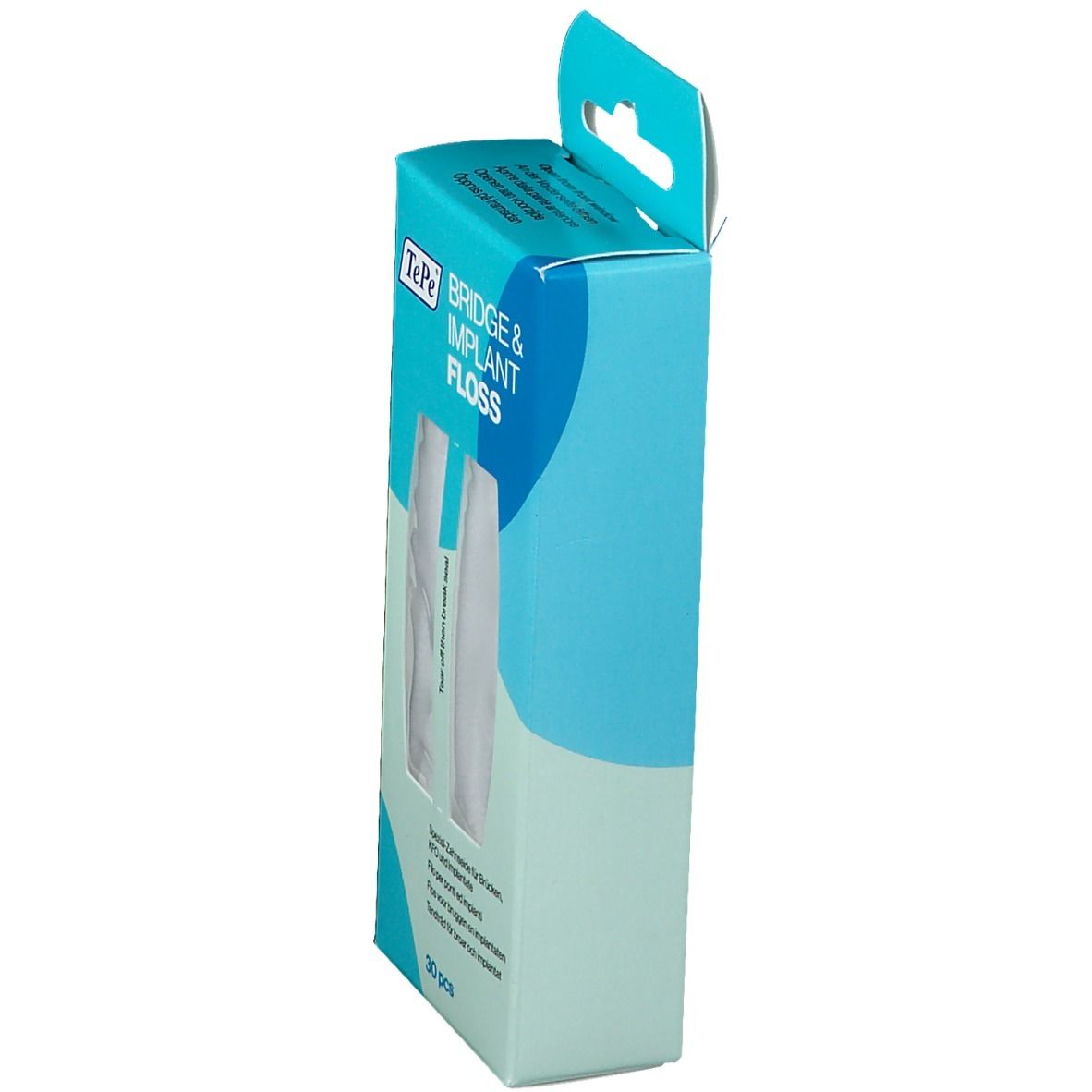 Zijaanzicht van de TePe® Bridge & Implant floss verpakking. Turquoise en witte doos met productinformatie.