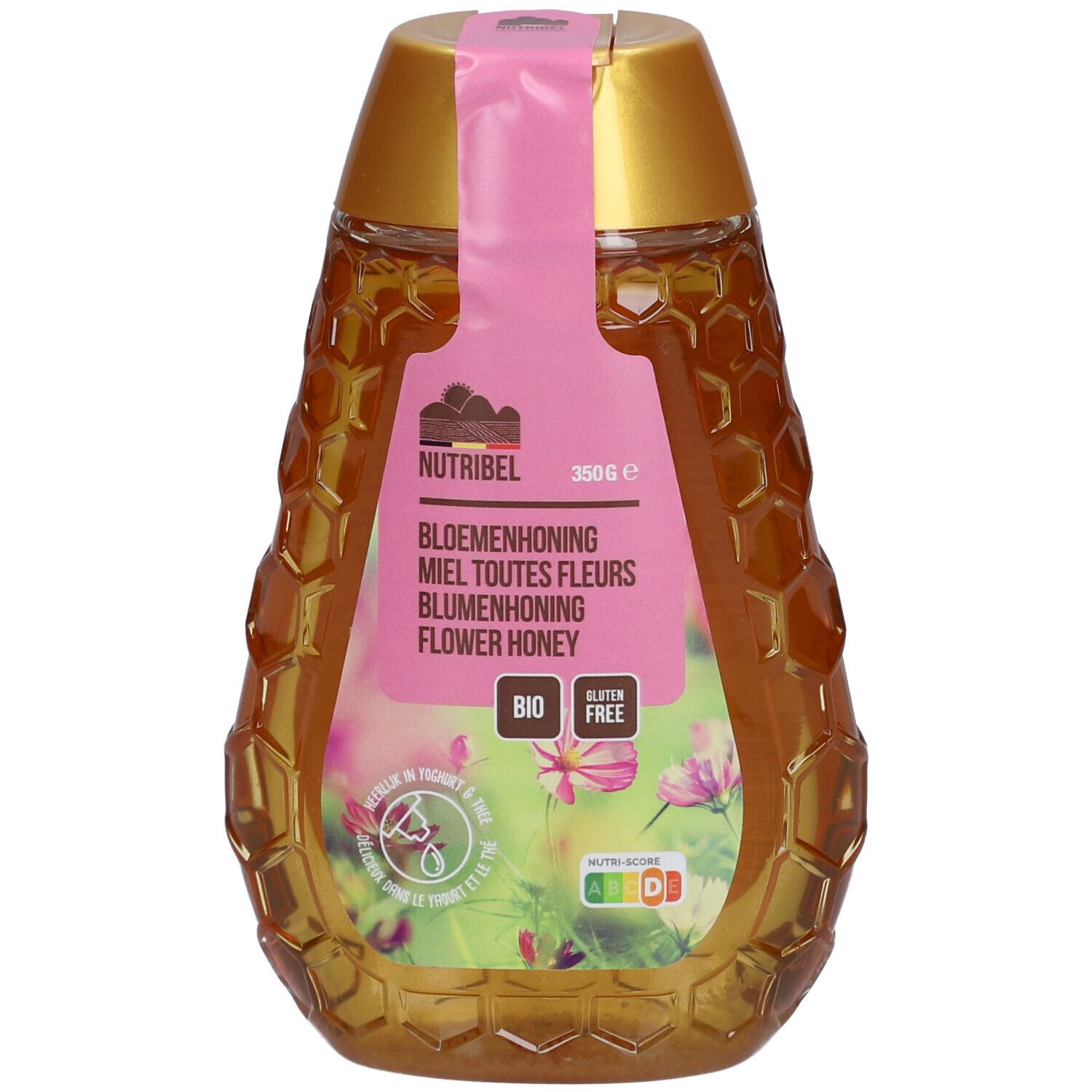 Flacon de miel en forme de nid d'abeilles. Étiquette avec nom du produit, label bio et informations nutritionnelles. Bouchon rose.