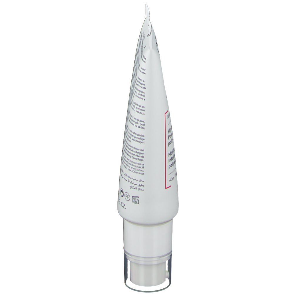 Witte tube, zijaanzicht. Productnaam en tekst in het Frans en Engels. Transparante pompkop.