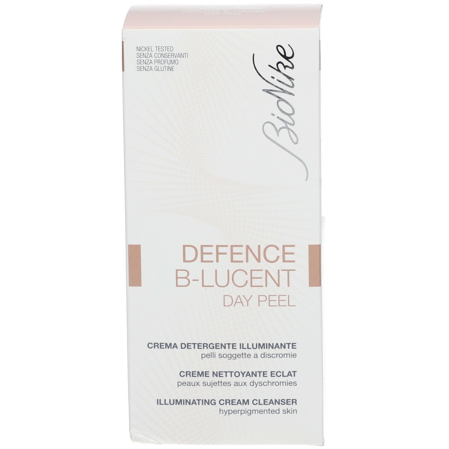 Emballage blanc avec DEFENCE B-LUCENT DAY PEEL. Marque BioNike. Testé au nickel, sans conservateurs, sans parfum, sans gluten.