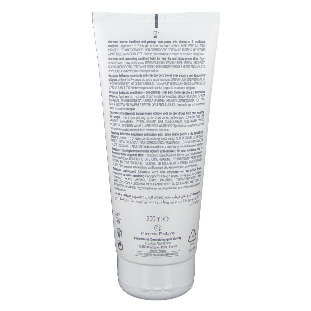 Dos d'un tube blanc. Texte en plusieurs langues. Contient des informations sur le produit et le fabricant.