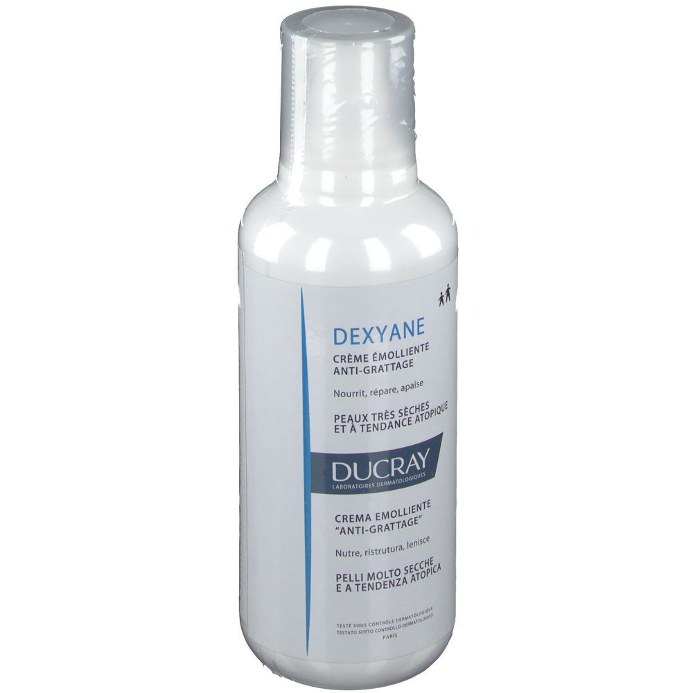 Witte fles DUCRAY DEXYANE crème. Tekst: Crème émolliente anti-grattage. Voor een zeer droge huid.