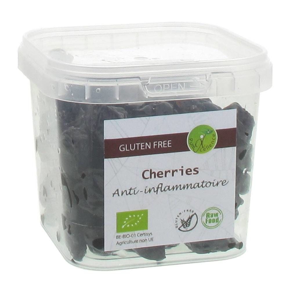 Transparante bak met kersen. Label met "GLUTEN FREE", "Cherries", "Anti-inflammatoire" en biologisch keurmerk.