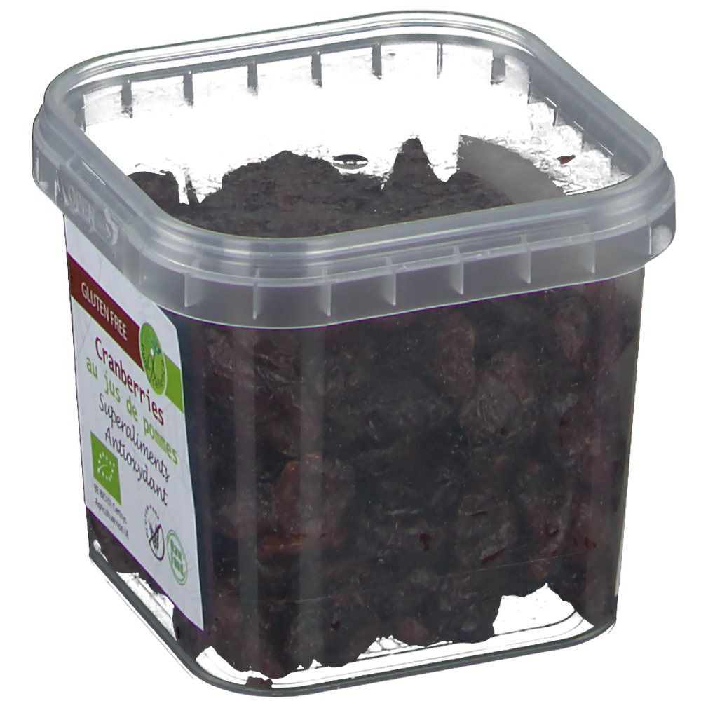 Récipient transparent avec des canneberges. Étiquette avec texte: Cranberries au jus de pommes, Superaliments, Antioxidant. Sans gluten.