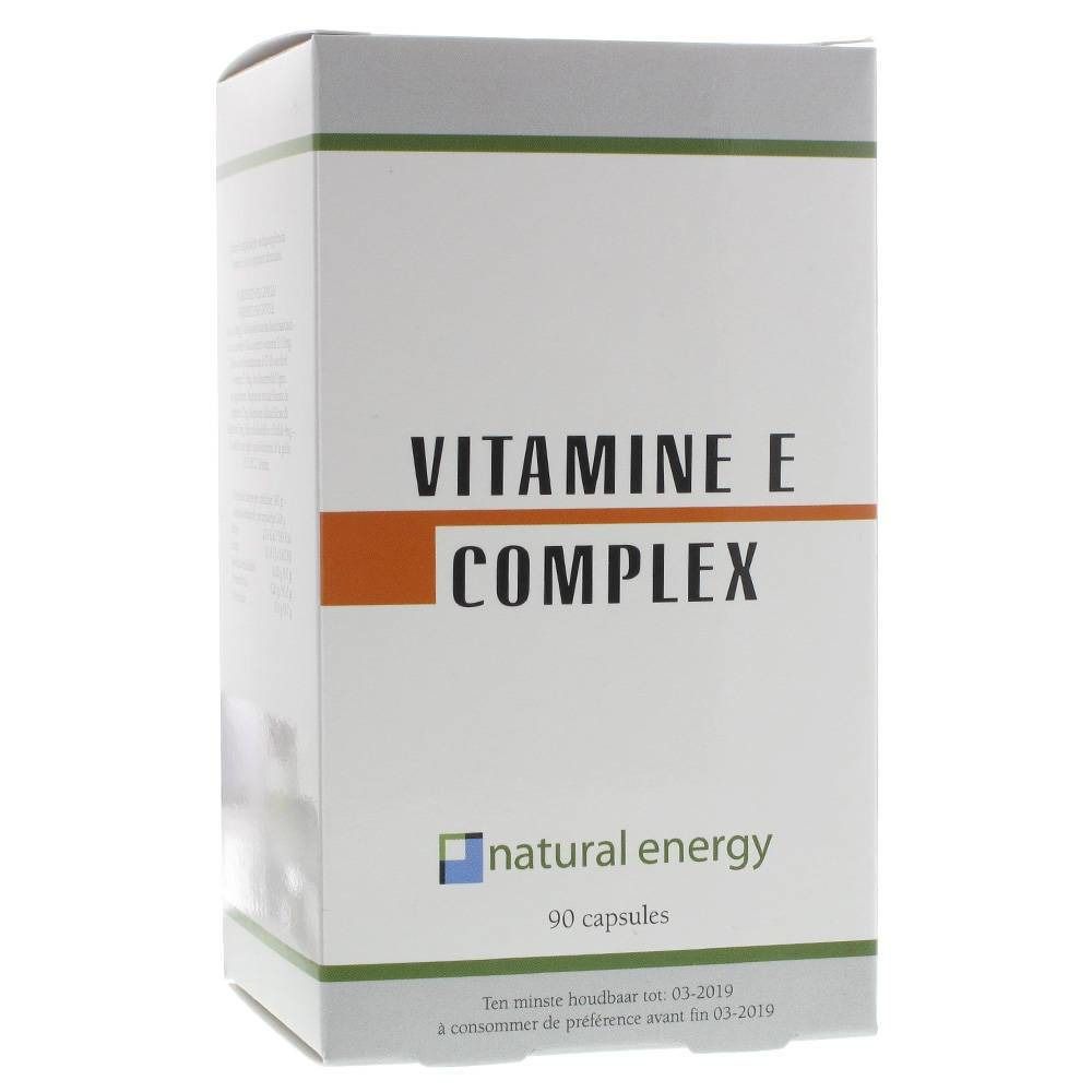 Boîte "VITAMINE E COMPLEX". Logo "natural energy" et "90 capsules". Bande orange horizontale. Vert en haut et en bas.