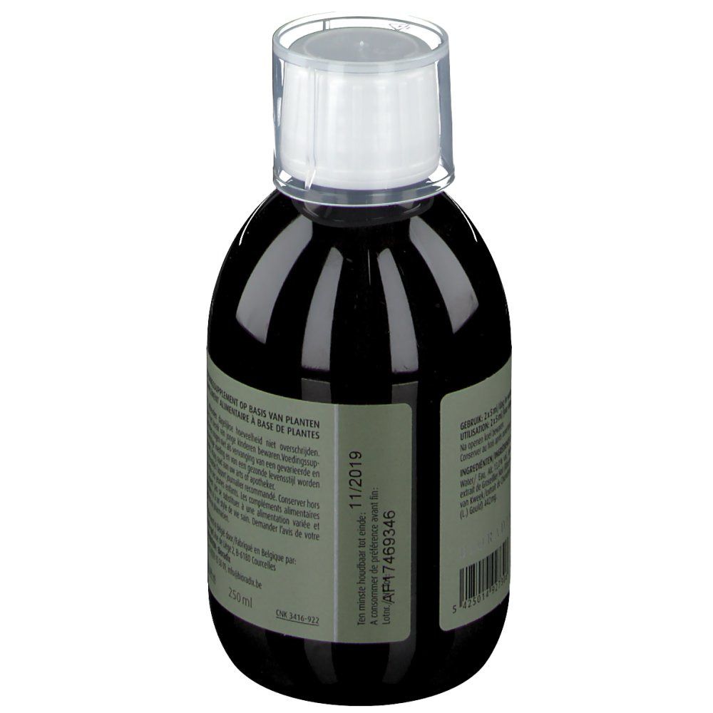 Liquide brun dans une bouteille avec bouchon blanc. Étiquette avec texte. Date de péremption: 11/2019. Code-barres.
