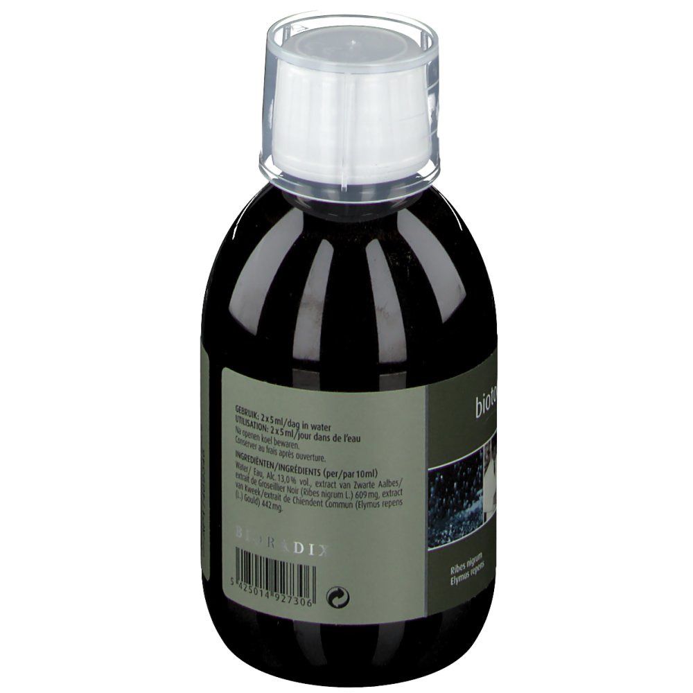 Liquide brun dans une bouteille avec bouchon blanc. Étiquette avec texte. Liste des ingrédients. Code-barres.