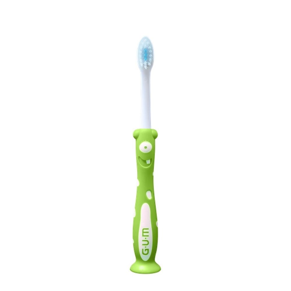 Brosse à dents G.U.M Kids verte avec design monstre. Soies souples, recommandée pour 2+.