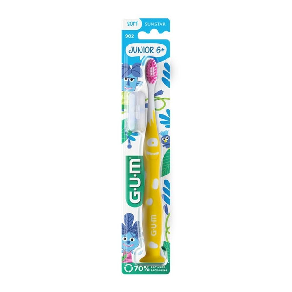 Brosse à dents GUM Junior 6+ en emballage. Turquoise, pois blancs, design monstre. Soies souples.