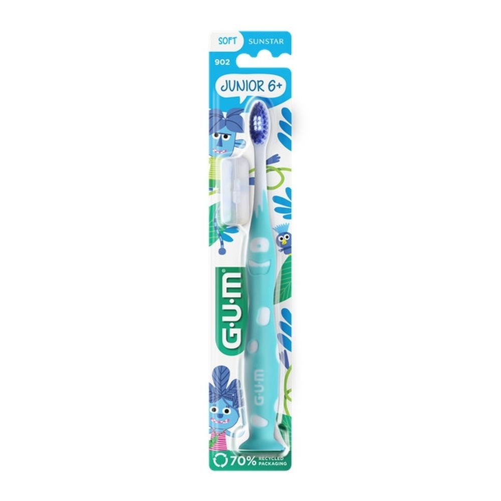 Dos de l'emballage. Texte multilingue. Brosse à dents GUM Junior.