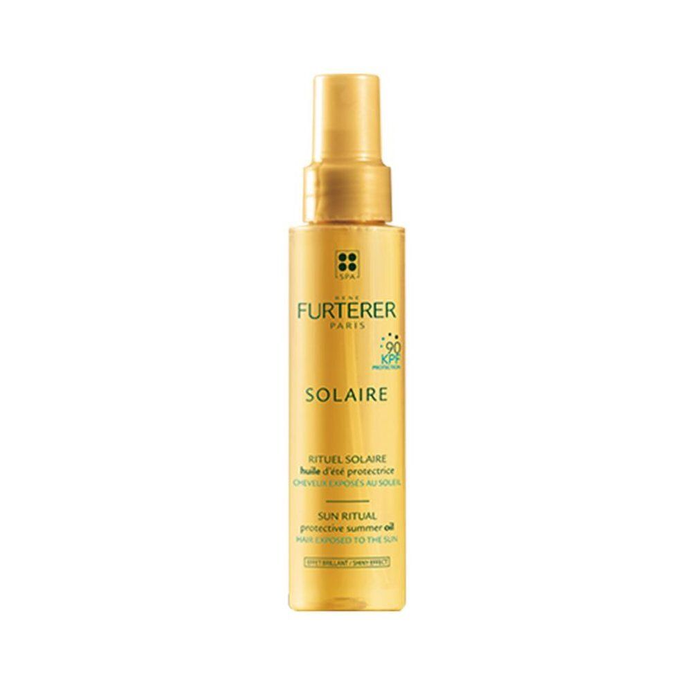 Gouden sprayfles René Furterer Solaire beschermende haarolie, KPF 50+.