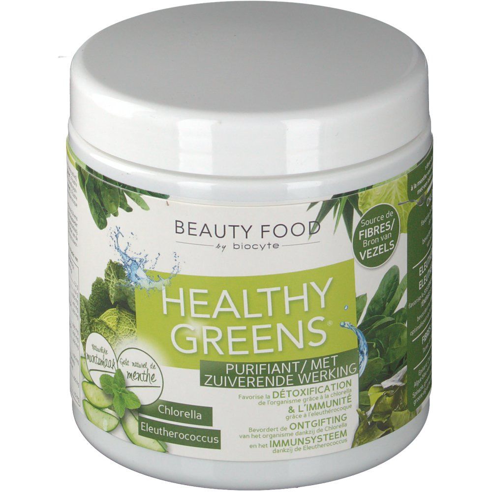 Pot blanc avec couvercle. Inscription "Healthy Greens" et "Beauty Food by Biocyte". Étiquettes vertes et blanches avec informations produit.