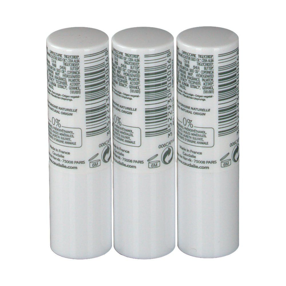 Trois sticks blancs avec code-barres et informations. Inscription: Caudalie. Indication 0%. Fabriqué en France.