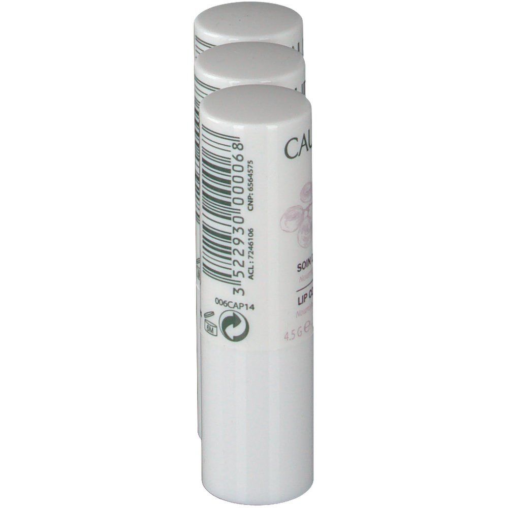 Trois sticks blancs. Inscription: Caudalie, Soin des Lèvres, Lip Conditioner. Code-barres et numéro de lot.