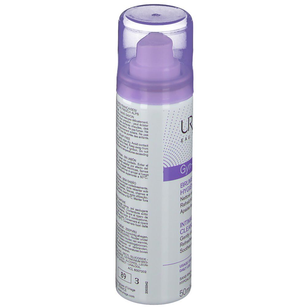 Cilindrische fles met verstuiver. Paarse en witte belettering. Tekst: Uriage, Gyn-Phy, Brume Nettoyante. Transparante dop.