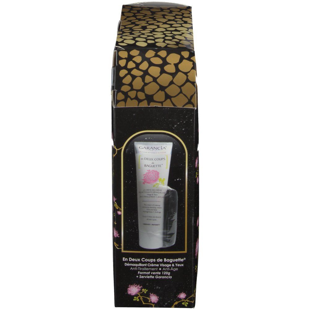 Vue latérale du coffret cadeau. Contient un tube. Emballage noir avec motif doré et noms de produits.
