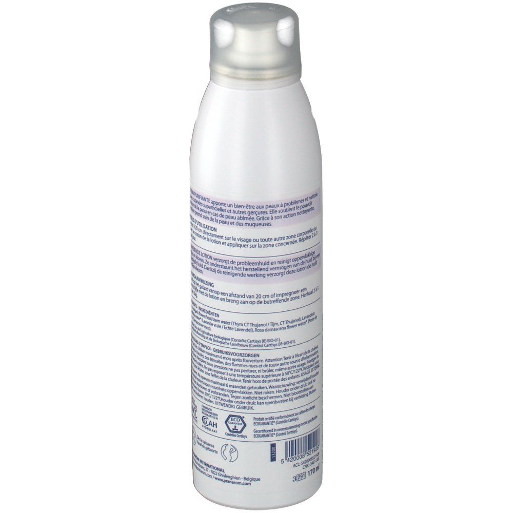 Witte fles met zilveren dop. Achterkant met tekst in meerdere talen. Barcode en andere informatie.