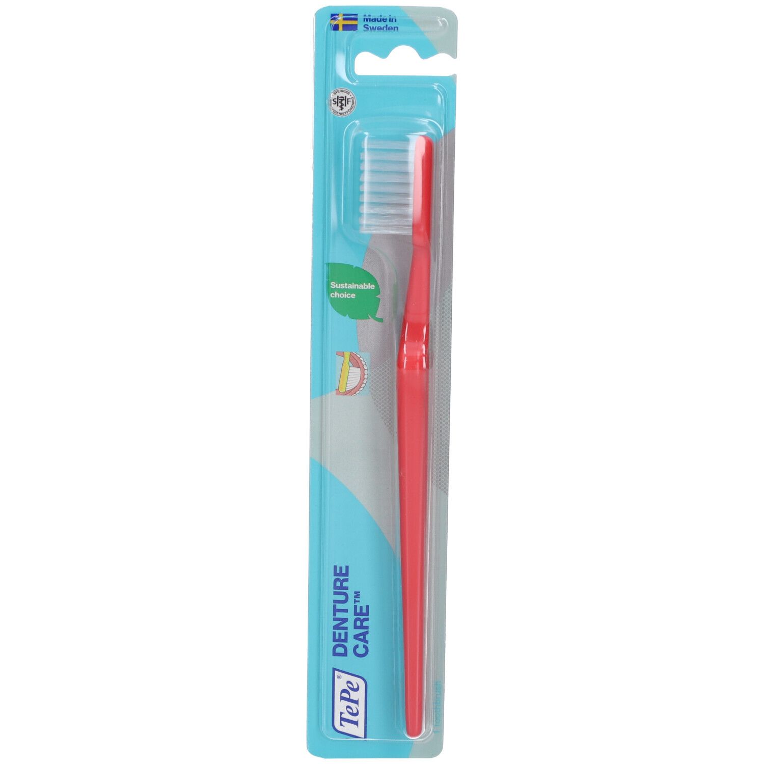 Brosse à dents avec manche rouge et tête blanche, emballée. Inscription : TePe DENTURE CARE™.