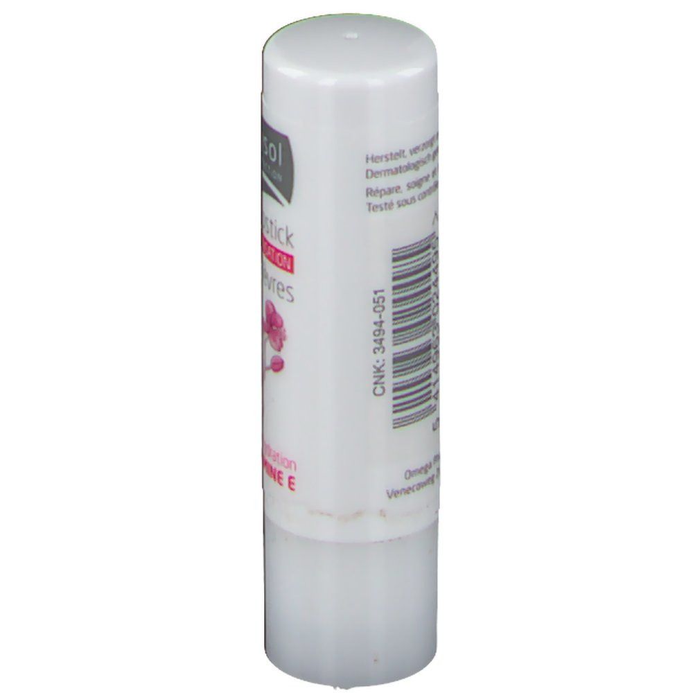 Witte lippenstift. Bedrukt met barcode en tekst. Fabrikantinformatie.